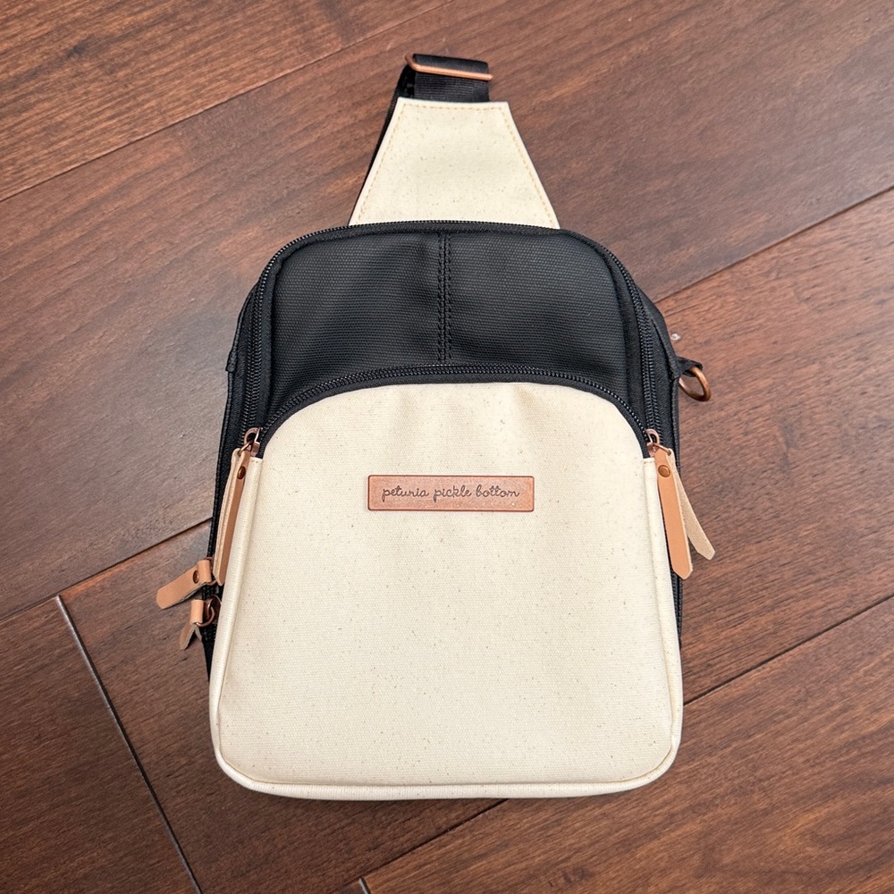 Petunia Pickle Bottom: Criss Cross Sling Bag - Black & Cream